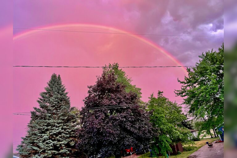 Michigan rainbow in fire sky